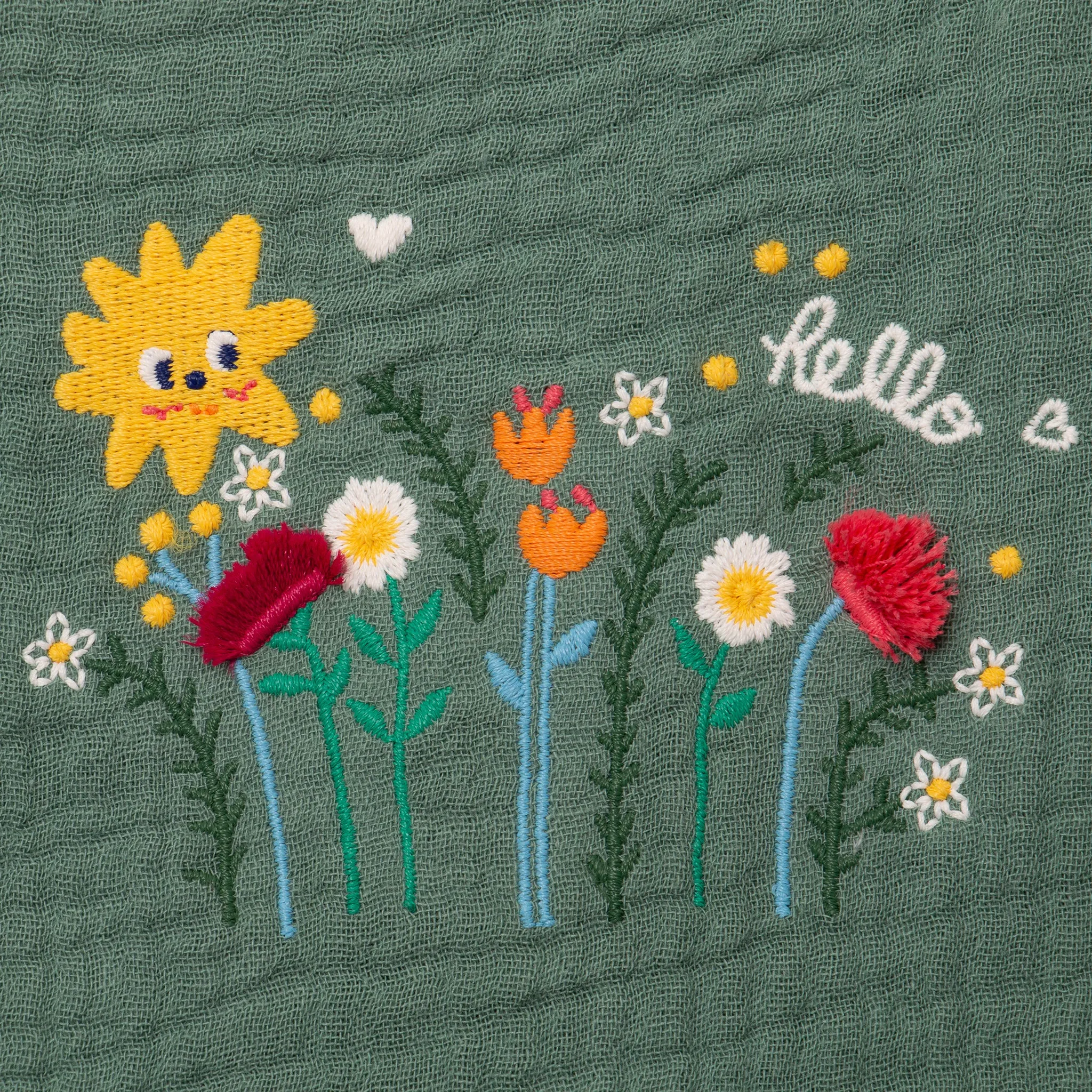 Newborn girls' green overalls in baby blanket material
